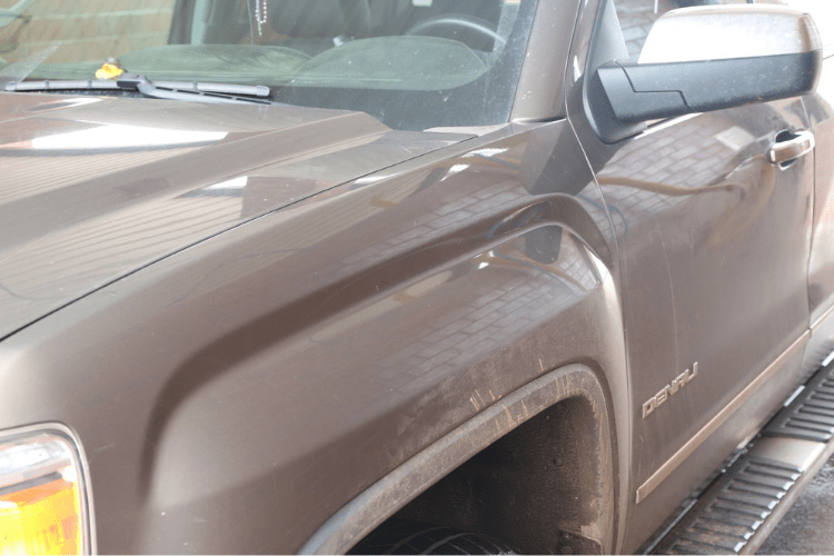 We started out with a 2015 GMC Denali Crew Cab truck that was pretty dirty. The Oklahoma red dirt is really hard to keep off of your paint.