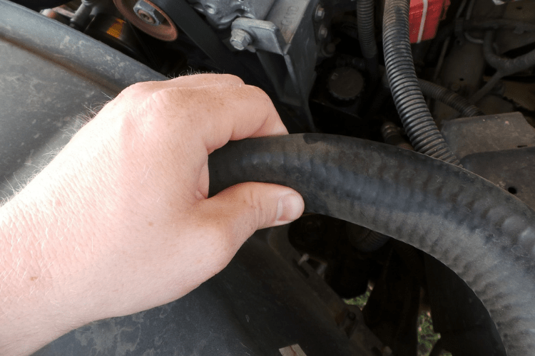 Check your hoses by pinching them (ONLY WHEN COOL!). If the hose collapses easily, then it needs to be replaced. Also look for cuts, abrasions, and bubbles.