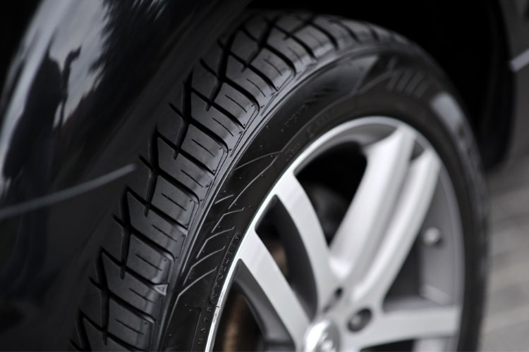 With a good quality product, a thin coat will still keep your tires looking polished.