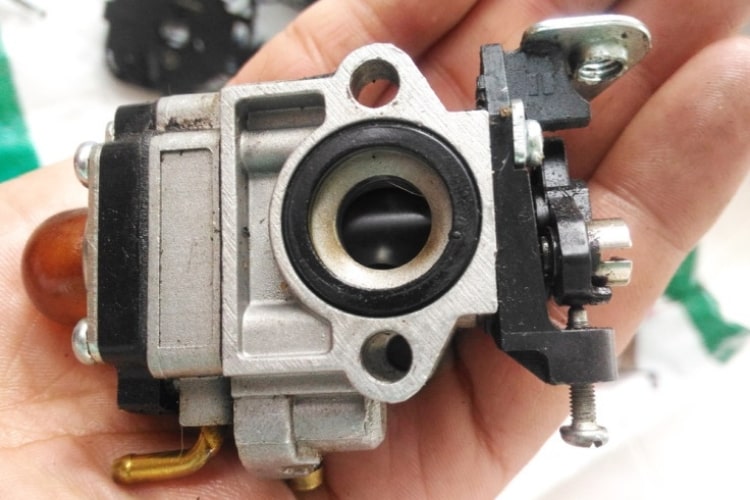 A lawn mower carburetor diagram is helpful in understanding the function of the part and reassembling.